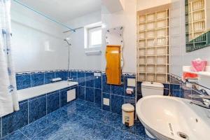 Koupelna v ubytování Casa Andra by Genco