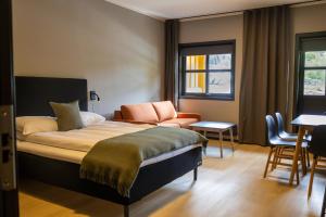 Postel nebo postele na pokoji v ubytování Flåmsbrygga Apartments