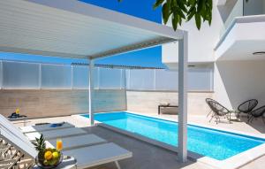 a swimming pool in the middle of a house at Cozy Home In Linardici in Linardići +37 photos