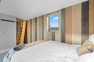 Voodi või voodid majutusasutuse Cosy Cabin Getaway - Ashbourne toas