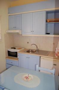 Kuchyň nebo kuchyňský kout v ubytování Angelina Apartments