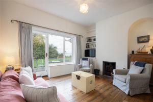 Istumisnurk majutusasutuses Fort Victoria Cottages - Solent Cottage