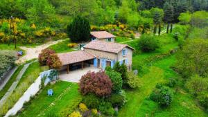 an aerial view of a house in a field at Brin d'Ardèche in Saint-Prix