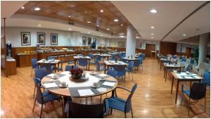 Ресторант или друго място за хранене в Extremadura Hotel