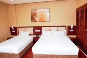 Letto o letti in una camera di Hotel Mirava