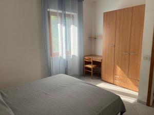 Katil atau katil-katil dalam bilik di Appartamento Marisa2 a soli 200mt dal mare