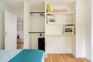 Ένα ή περισσότερα κρεβάτια σε δωμάτιο στο La Villa Tome , Appartement dans maison individuelle, piscine +34 φωτογραφίες