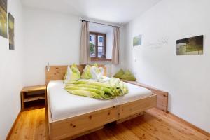 Postel nebo postele na pokoji v ubytování Bertollhof Apfelerlebnis