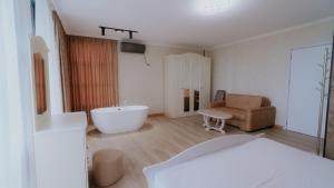 Postel nebo postele na pokoji v ubytování Villa Ikalto