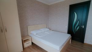 Postel nebo postele na pokoji v ubytování Villa Ikalto