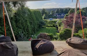 a view of a garden from the deck of a boat at Båt huset in Halmstad