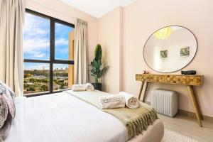 Postel nebo postele na pokoji v ubytování FIRST CLASS 1BR Classic Luxe Getaway + 24 fotografií