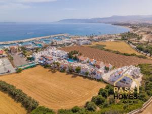 an aerial view of a resort next to the ocean at Aphrodite Apartment in Lachi +6 photos