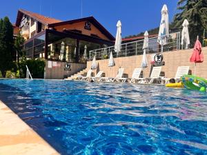 The swimming pool at or close to ArdoVel Park Hotel