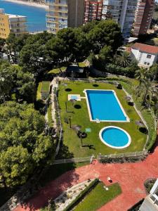 an aerial view of a park with a swimming pool at Ocean View Apartment in Alicante
