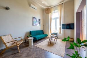 TV a/nebo společenská místnost v ubytování Budapest Central Artpark Suites