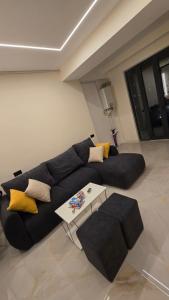 Ruang duduk di Cozy apartament near to center