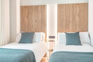 Posteľ alebo postele v izbe v ubytovaní Modern with swimming pool- 2Bd 2Bth- Triana