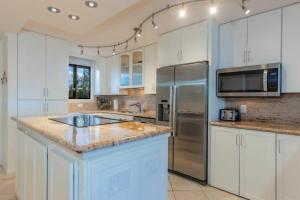 Η κουζίνα ή μικρή κουζίνα στο Kanai A Nalu 414