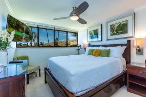 Ένα ή περισσότερα κρεβάτια σε δωμάτιο στο Kanai A Nalu 414 +50 φωτογραφίες