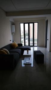 Ruang duduk di Cozy apartament near to center