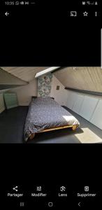 a picture of a bedroom with a bed in a room at Chambre proche circuit 4 personnes in Le Mans