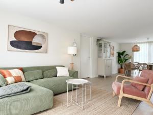 Et opholdsområde på Vakantiehuis voor mindervaliden op Recreatiepark De Wielen - 61