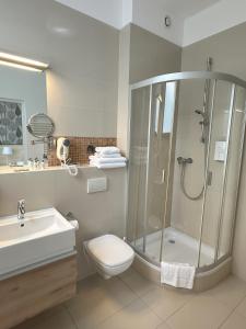 Kúpeľňa v ubytovaní Golden Tulip Międzyzdroje Residence