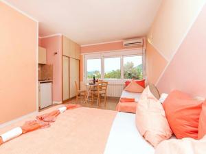 Postel nebo postele na pokoji v ubytování Apartments MIK5 - Famous Beach Jaz