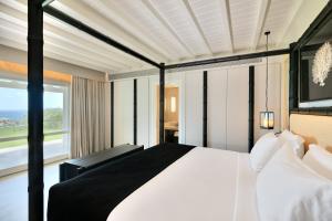 Voodi või voodid majutusasutuse Santa Marina, A Luxury Collection Resort, Mykonos toas