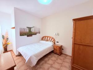 Postel nebo postele na pokoji v ubytování Hostal Castilla