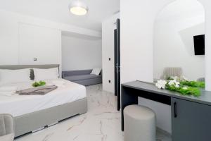 Кровать или кровати в номере Glaroi 3