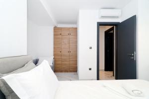 Кровать или кровати в номере Glaroi 3