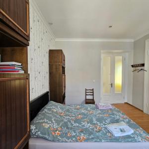 Postel nebo postele na pokoji v ubytování Rooms in old Tbilisi