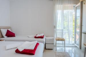 Postel nebo postele na pokoji v ubytování Guest House Vucicevic