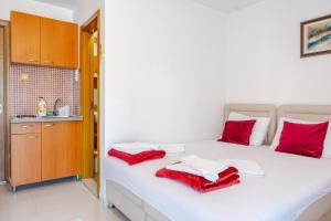 Postel nebo postele na pokoji v ubytování Guest House Vucicevic