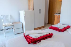 Postel nebo postele na pokoji v ubytování Guest House Vucicevic