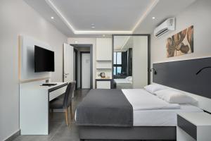 TV a/nebo společenská místnost v ubytování Kaila Krizantem Hotel