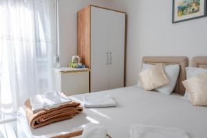 Postel nebo postele na pokoji v ubytování Guest House Vucicevic
