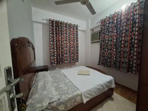 Un pat sau paturi într-o cameră la david hostel