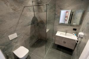 Baðherbergi á Hotel 5 Stinet