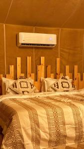 Postel nebo postele na pokoji v ubytování Eco Desert Camp