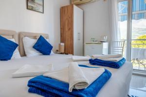 Postel nebo postele na pokoji v ubytování Guest House Vucicevic