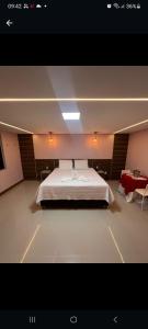 Postel nebo postele na pokoji v ubytování Hotel Absolar + 37 fotografií