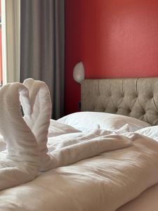 Postel nebo postele na pokoji v ubytování Hotel Savoia