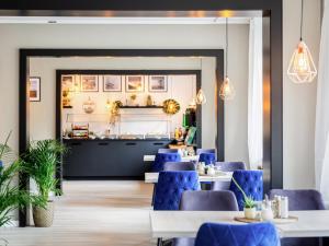 Predel za sedenje v nastanitvi DORMERO Hotel Weimar