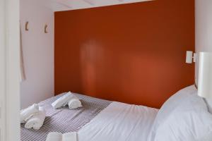 Slow Village Biscarrosse Lac客房内的一张或多张床位