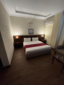 Hotel Crescent客房内的一张或多张床位