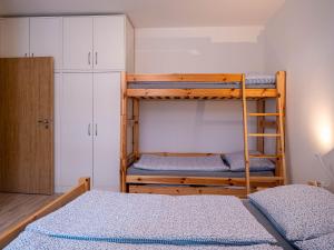 Postel nebo postele na pokoji v ubytování Apartmán Karlova Studánka