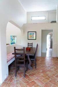a dining room with a table and chairs at Beautiful private Villa with pool, Boliqueime, Loulé in Boliqueime +22 photos